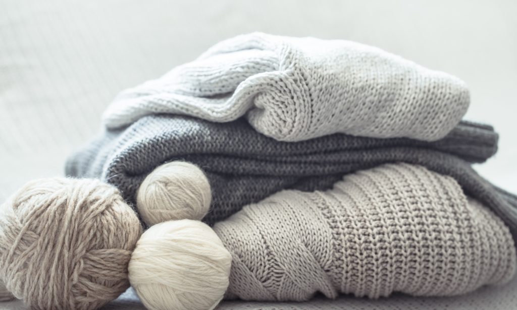 Sweater and knitting materials